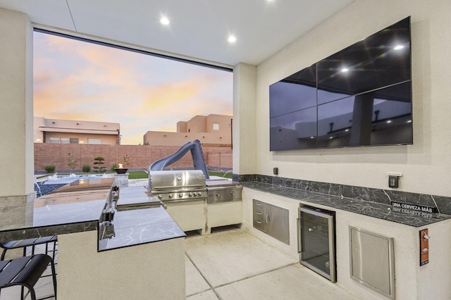 7900 Aguila St NW, Albuquerque, NM 87120 - view of patio with area for grilling and beverage cooler