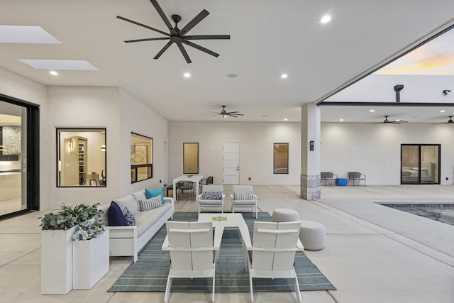 7900 Aguila St NW, Albuquerque, NM 87120 - living room featuring a ceiling fan and recessed lighting