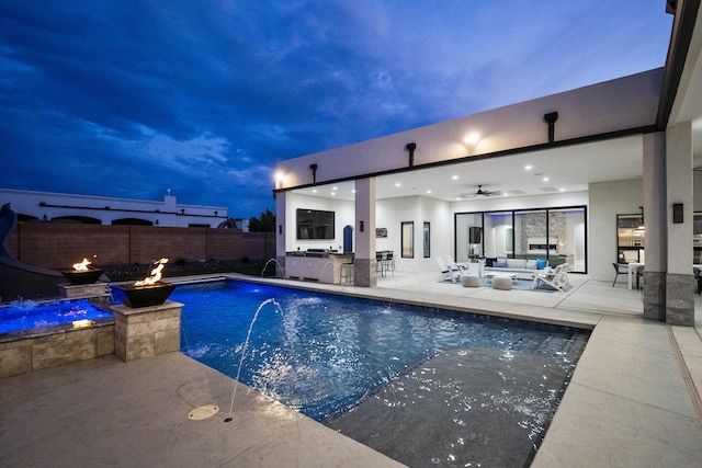 7900 Aguila St NW, Albuquerque, NM 87120 - view of pool with an outdoor living space with a fire pit, a patio, a ceiling fan, and an in-ground hot tub