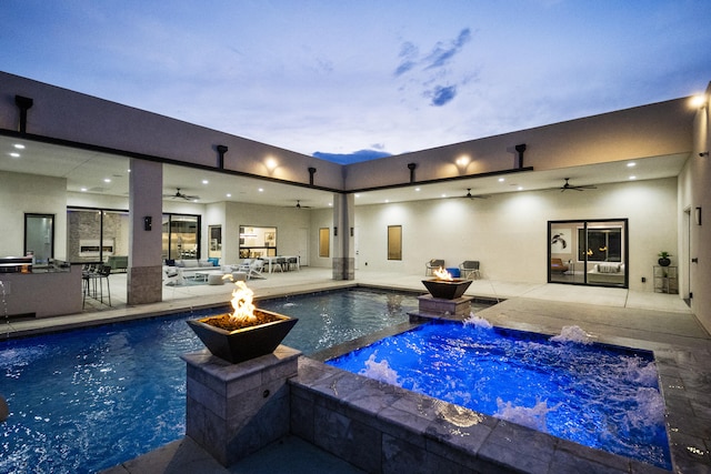 7900 Aguila St NW, Albuquerque, NM 87120 - view of pool with ceiling fan, a fire pit, an outdoor kitchen, and a patio