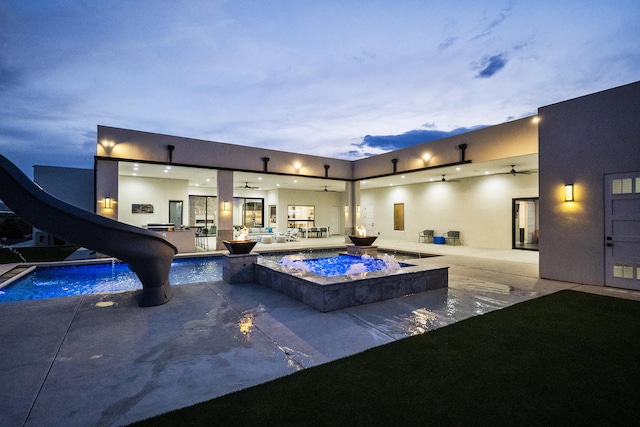 7900 Aguila St NW, Albuquerque, NM 87120 - outdoor pool with a water slide, ceiling fan, an in-ground hot tub, and a patio