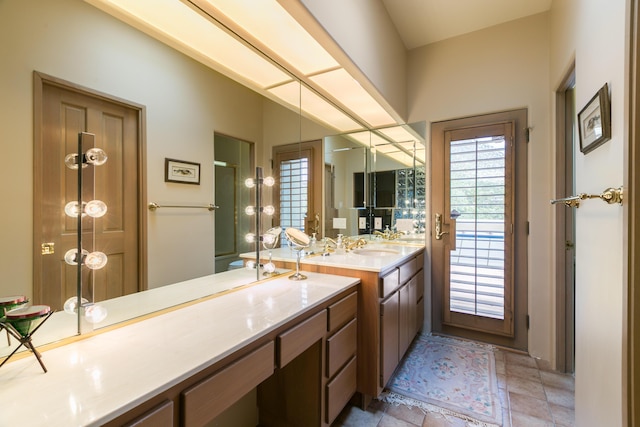 213 Spring Creek Pl NE, Albuquerque, NM 87122 - bathroom featuring vanity and stone finish floors