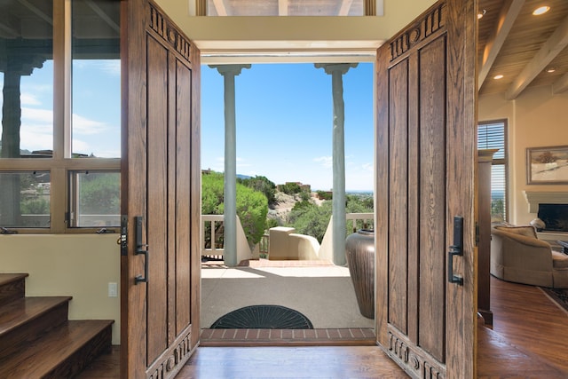 213 Spring Creek Pl NE, Albuquerque, NM 87122 - doorway to outside with wood finished floors, recessed lighting, stairway, and a fireplace