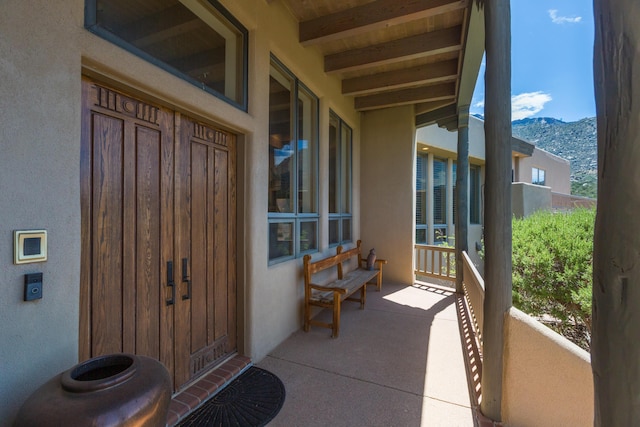 213 Spring Creek Pl NE, Albuquerque, NM 87122 - entrance to property featuring stucco siding and a mountain view