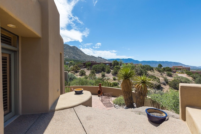 213 Spring Creek Pl NE, Albuquerque, NM 87122 - view of patio / terrace featuring a mountain view
