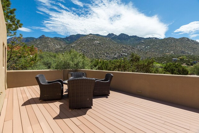 213 Spring Creek Pl NE, Albuquerque, NM 87122 - deck with a mountain view and outdoor dining space