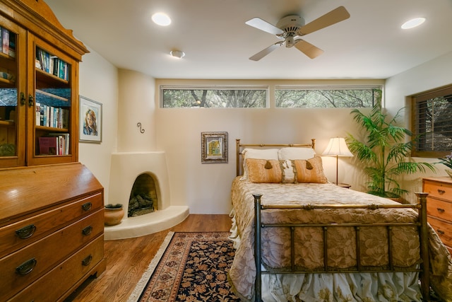 213 Spring Creek Pl NE, Albuquerque, NM 87122 - bedroom with wood finished floors, multiple windows, recessed lighting, and ceiling fan
