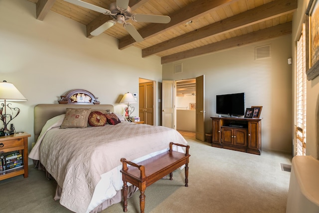 213 Spring Creek Pl NE, Albuquerque, NM 87122 - bedroom featuring a wooden ceiling with exposed beams, light colored carpet, and a ceiling fan