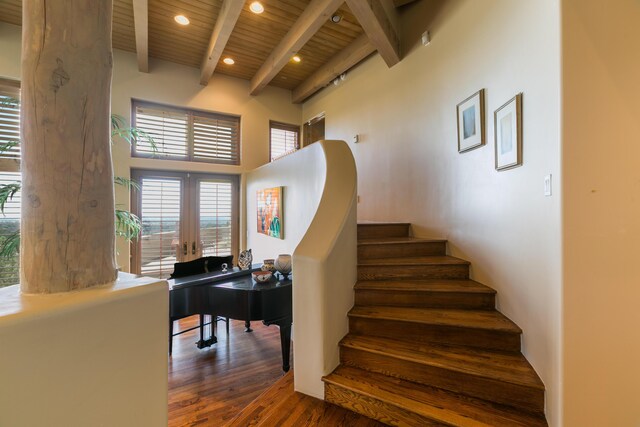 213 Spring Creek Pl NE, Albuquerque, NM 87122 - stairs featuring a wooden ceiling with exposed beams, wood finished floors, recessed lighting, and french doors