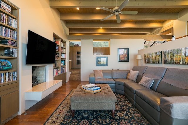 213 Spring Creek Pl NE, Albuquerque, NM 87122 - living area with wood finished floors, a wooden ceiling with exposed beams, ceiling fan, and built in features