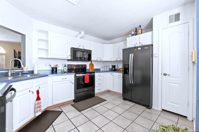 6412 Saint Josephs Ave NW, Albuquerque, NM 87120 - kitchen with black appliances, open shelves, white cabinets, and a textured ceiling