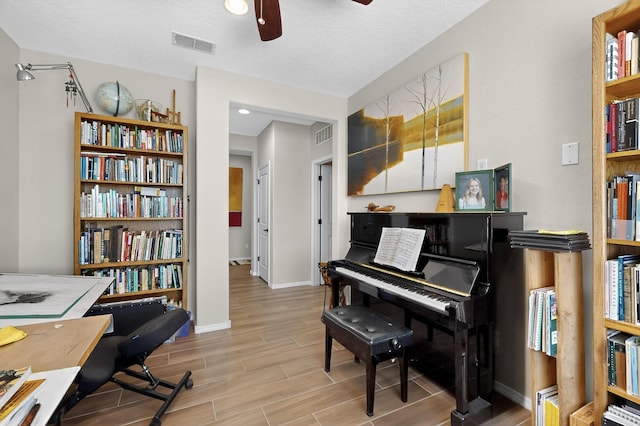 6417 Kings Cyn NE, Rio Rancho, NM 87144 - office featuring ceiling fan and wood finished floors