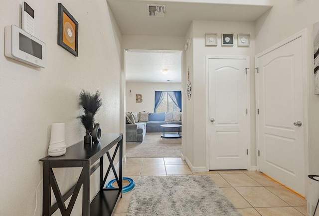 148 El Camino Loop NW, Rio Rancho, NM 87144 - entryway with light tile patterned floors
