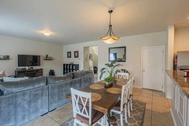 148 El Camino Loop NW, Rio Rancho, NM 87144 - dining area with light tile patterned floors