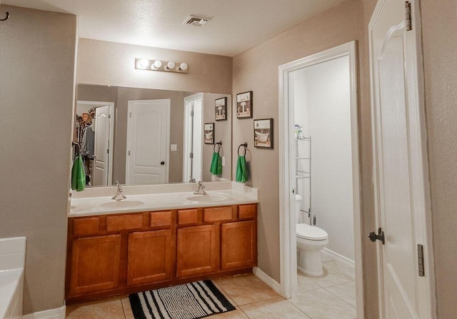 148 El Camino Loop NW, Rio Rancho, NM 87144 - full bath featuring tile patterned floors and double vanity