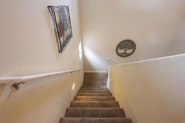148 El Camino Loop NW, Rio Rancho, NM 87144 - stairway with carpet flooring