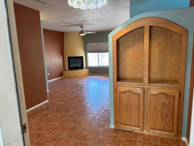 5400 Pegasus Dr NW, Albuquerque, NM 87120 - hall with a textured ceiling and tile patterned floors