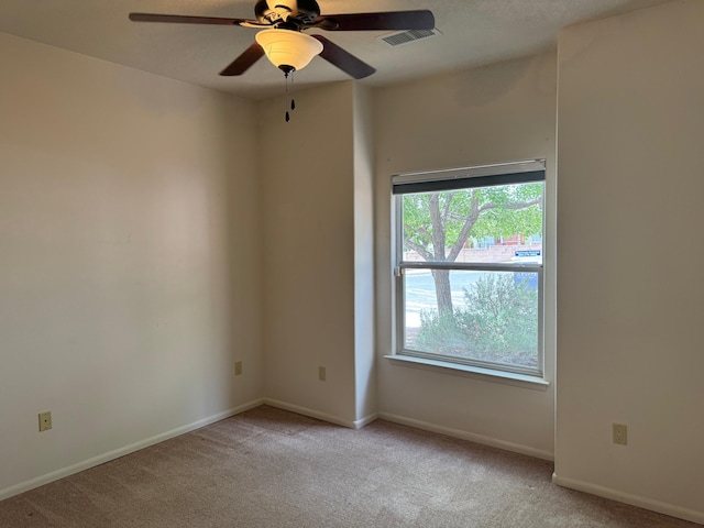 5400 Pegasus Dr NW, Albuquerque, NM 87120 - empty room featuring light colored carpet and a ceiling fan