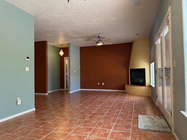 5400 Pegasus Dr NW, Albuquerque, NM 87120 - unfurnished living room with tile patterned flooring, a textured ceiling, ceiling fan, and french doors