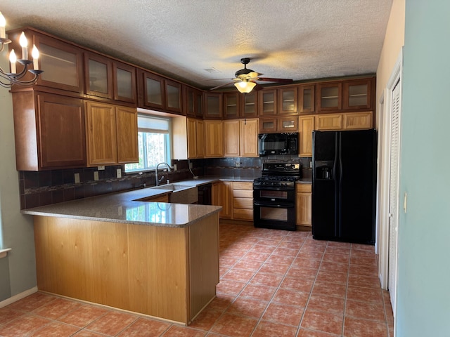 5400 Pegasus Dr NW, Albuquerque, NM 87120 - kitchen with black appliances, a peninsula, decorative backsplash, a ceiling fan, and a textured ceiling