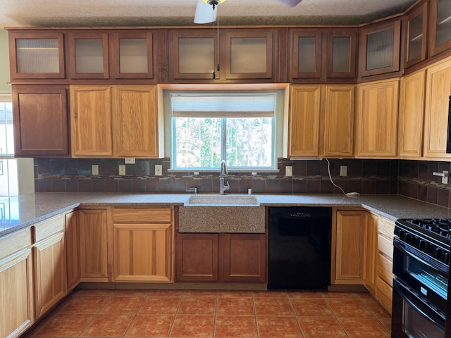 5400 Pegasus Dr NW, Albuquerque, NM 87120 - kitchen with black appliances, backsplash, light tile patterned floors, and glass insert cabinets
