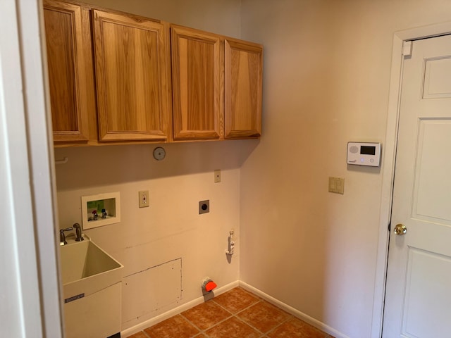 5400 Pegasus Dr NW, Albuquerque, NM 87120 - laundry room featuring cabinet space, hookup for a washing machine, hookup for an electric dryer, and tile patterned flooring