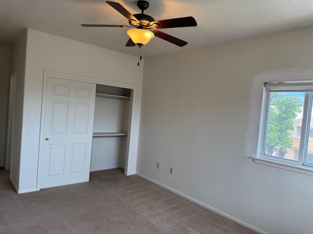 5400 Pegasus Dr NW, Albuquerque, NM 87120 - unfurnished bedroom with a closet, carpet flooring, and ceiling fan