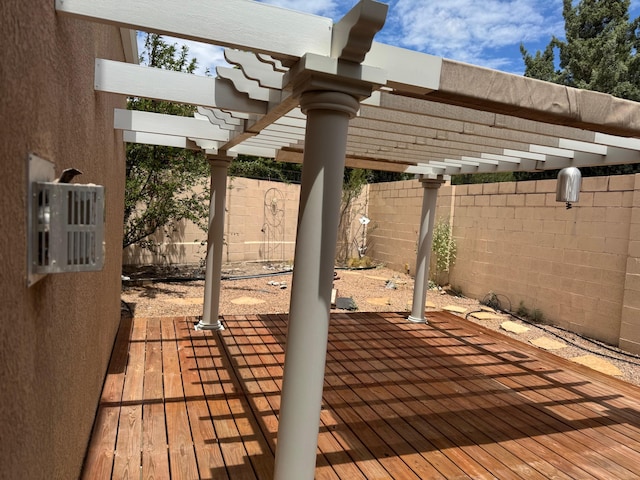 5400 Pegasus Dr NW, Albuquerque, NM 87120 - wooden deck featuring a fenced backyard and a pergola