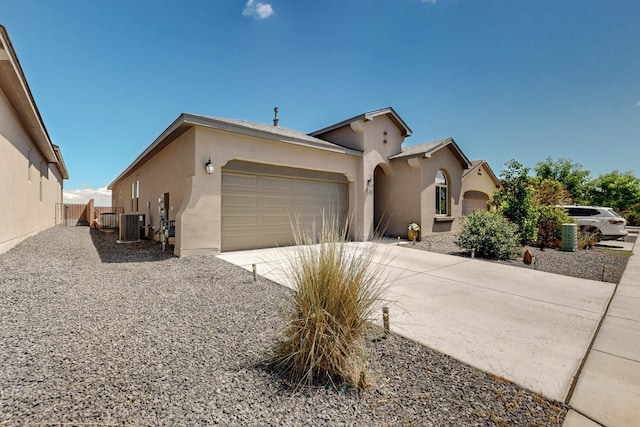 4293 Crowned Eagle Loop NE, Rio Rancho, NM 87144 - view of front of property with stucco siding, concrete driveway, and a garage