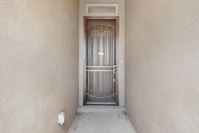 4293 Crowned Eagle Loop NE, Rio Rancho, NM 87144 - view of exterior entry with stucco siding