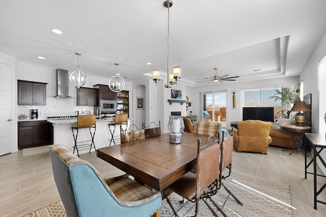 4293 Crowned Eagle Loop NE, Rio Rancho, NM 87144 - dining area with a ceiling fan, a chandelier, and recessed lighting