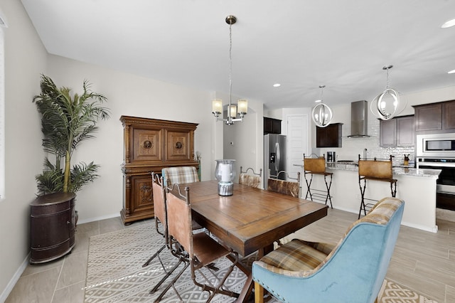 4293 Crowned Eagle Loop NE, Rio Rancho, NM 87144 - dining space featuring a chandelier and recessed lighting