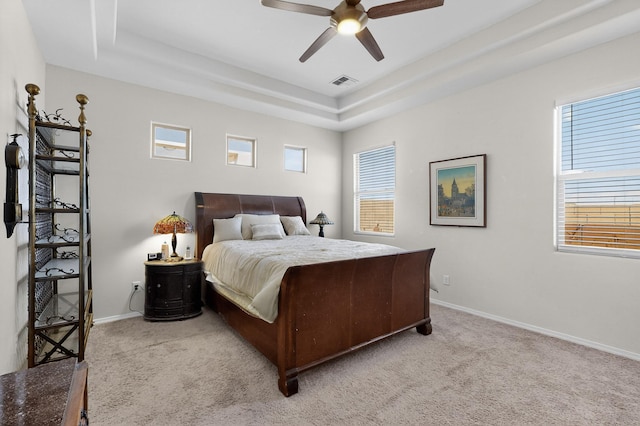 4293 Crowned Eagle Loop NE, Rio Rancho, NM 87144 - carpeted bedroom featuring a raised ceiling and a ceiling fan