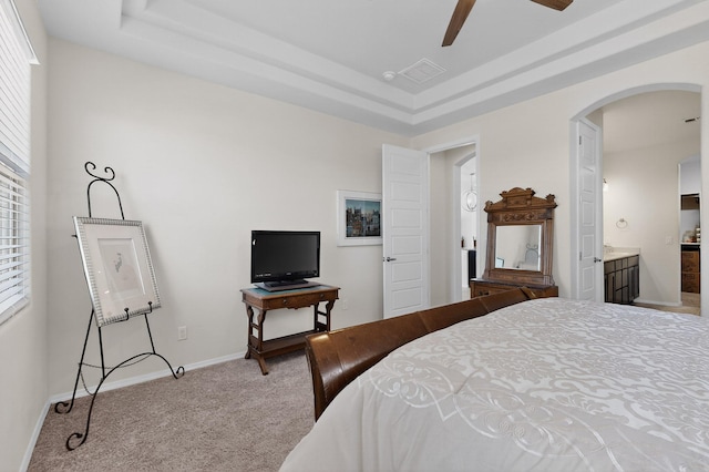4293 Crowned Eagle Loop NE, Rio Rancho, NM 87144 - bedroom with carpet flooring, arched walkways, a raised ceiling, and a ceiling fan