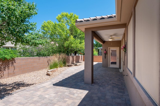 959 Salt Cedar Ct, Bernalillo, NM 87004 - fenced backyard with a patio and ceiling fan