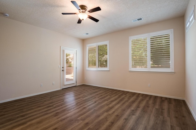 959 Salt Cedar Ct, Bernalillo, NM 87004 - empty room with dark wood-type flooring, a textured ceiling, a ceiling fan, and a smoke detector