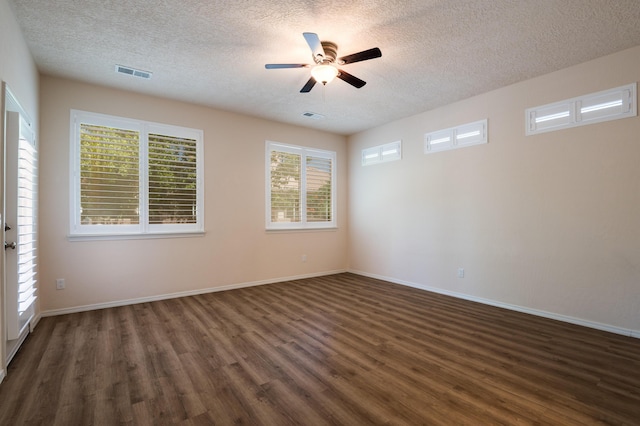 959 Salt Cedar Ct, Bernalillo, NM 87004 - empty room featuring dark wood-style floors, a textured ceiling, and ceiling fan