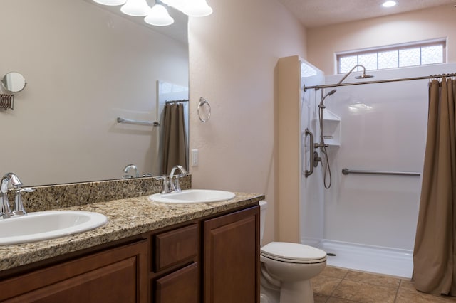 959 Salt Cedar Ct, Bernalillo, NM 87004 - full bath with a shower with curtain and double vanity