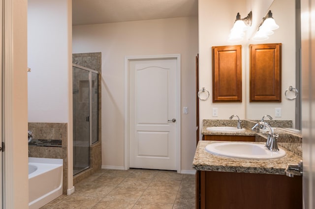 959 Salt Cedar Ct, Bernalillo, NM 87004 - bathroom with a shower stall, a bath, double vanity, and tile patterned floors