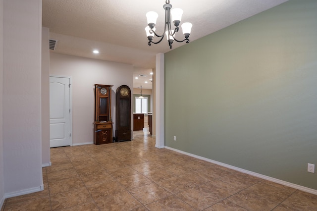 959 Salt Cedar Ct, Bernalillo, NM 87004 - unfurnished room featuring a chandelier and recessed lighting