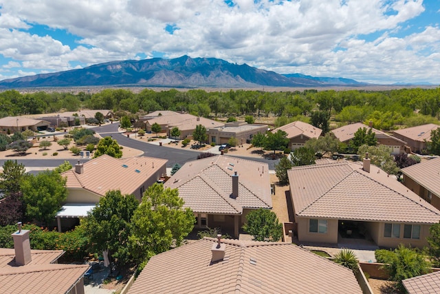 959 Salt Cedar Ct, Bernalillo, NM 87004 - aerial perspective of suburban area featuring a mountain backdrop