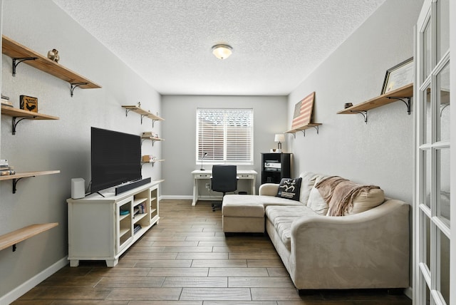 9015 Vista Dibujo Rd, Albuquerque, NM 87120 - living room featuring wood finished floors, a textured ceiling, and an office area