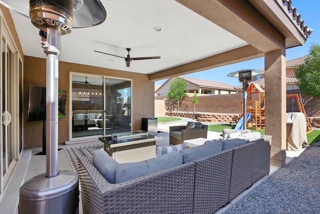 9015 Vista Dibujo Rd, Albuquerque, NM 87120 - fenced backyard with a playground, outdoor lounge area, a ceiling fan, and a patio