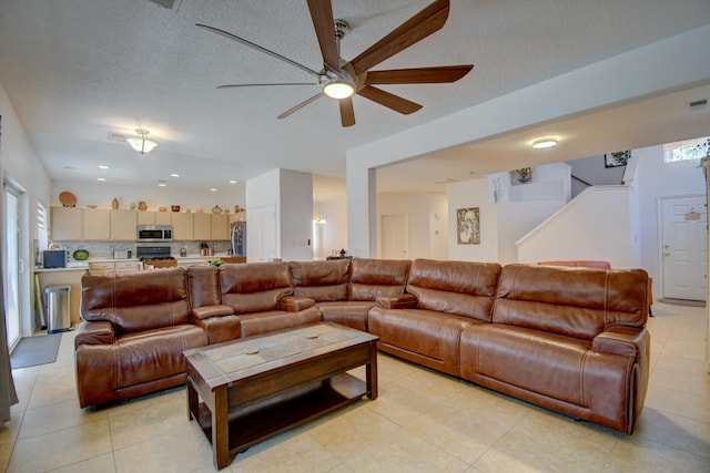 7024 Tree Line Ave NW, Albuquerque, NM 87114 - living area with ceiling fan, light tile patterned floors, recessed lighting, and stairs