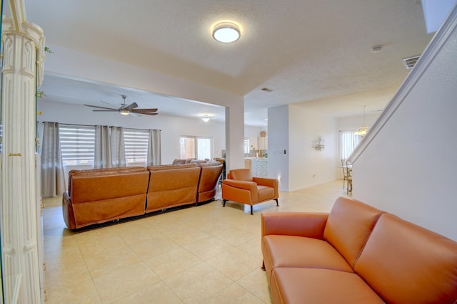 7024 Tree Line Ave NW, Albuquerque, NM 87114 - living room featuring ceiling fan and light tile patterned floors