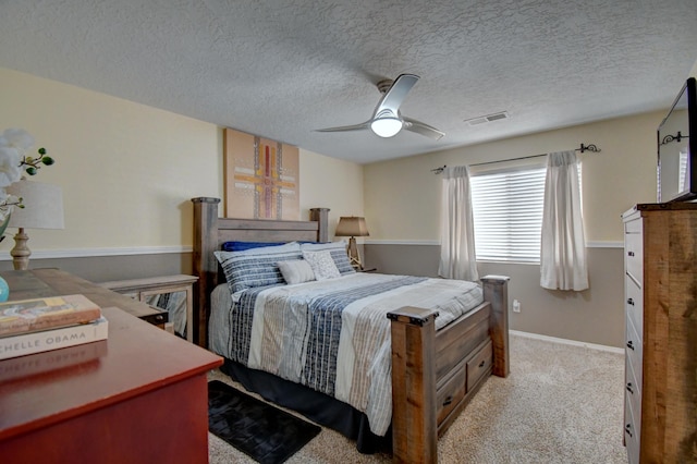 7024 Tree Line Ave NW, Albuquerque, NM 87114 - bedroom featuring light carpet, ceiling fan, and a textured ceiling