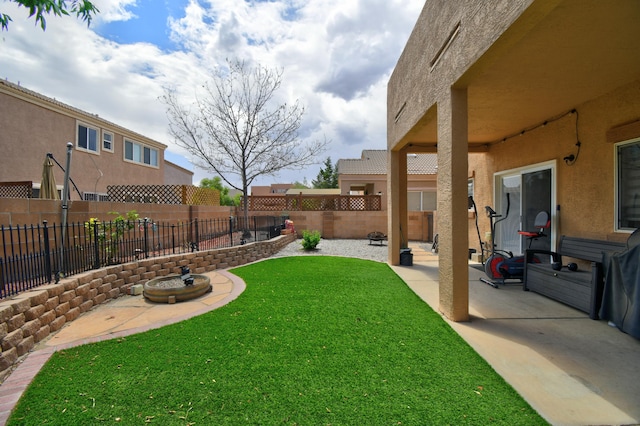 7024 Tree Line Ave NW, Albuquerque, NM 87114 - fenced backyard with a patio