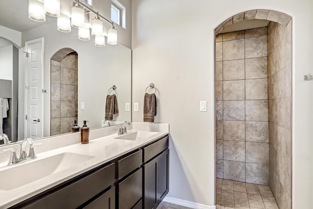 4236 Crowned Eagle Loop NE, Rio Rancho, NM 87144 - full bathroom featuring double vanity and tiled shower