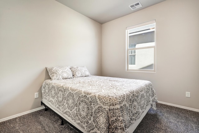4236 Crowned Eagle Loop NE, Rio Rancho, NM 87144 - bedroom featuring dark carpet and baseboards