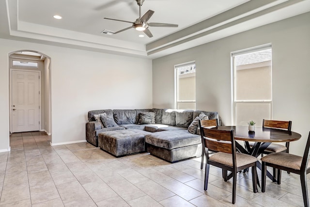 4236 Crowned Eagle Loop NE, Rio Rancho, NM 87144 - living area with a tray ceiling, arched walkways, a ceiling fan, and recessed lighting